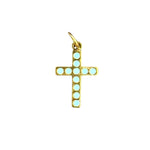 Turquoise studded cross charm