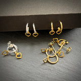 Embrace sterling silver and gold heart hoops