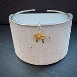 Bow charm Sterling silver bangle gold plated bow.