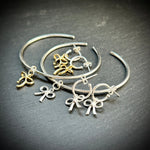Bow charm bangles and earrings