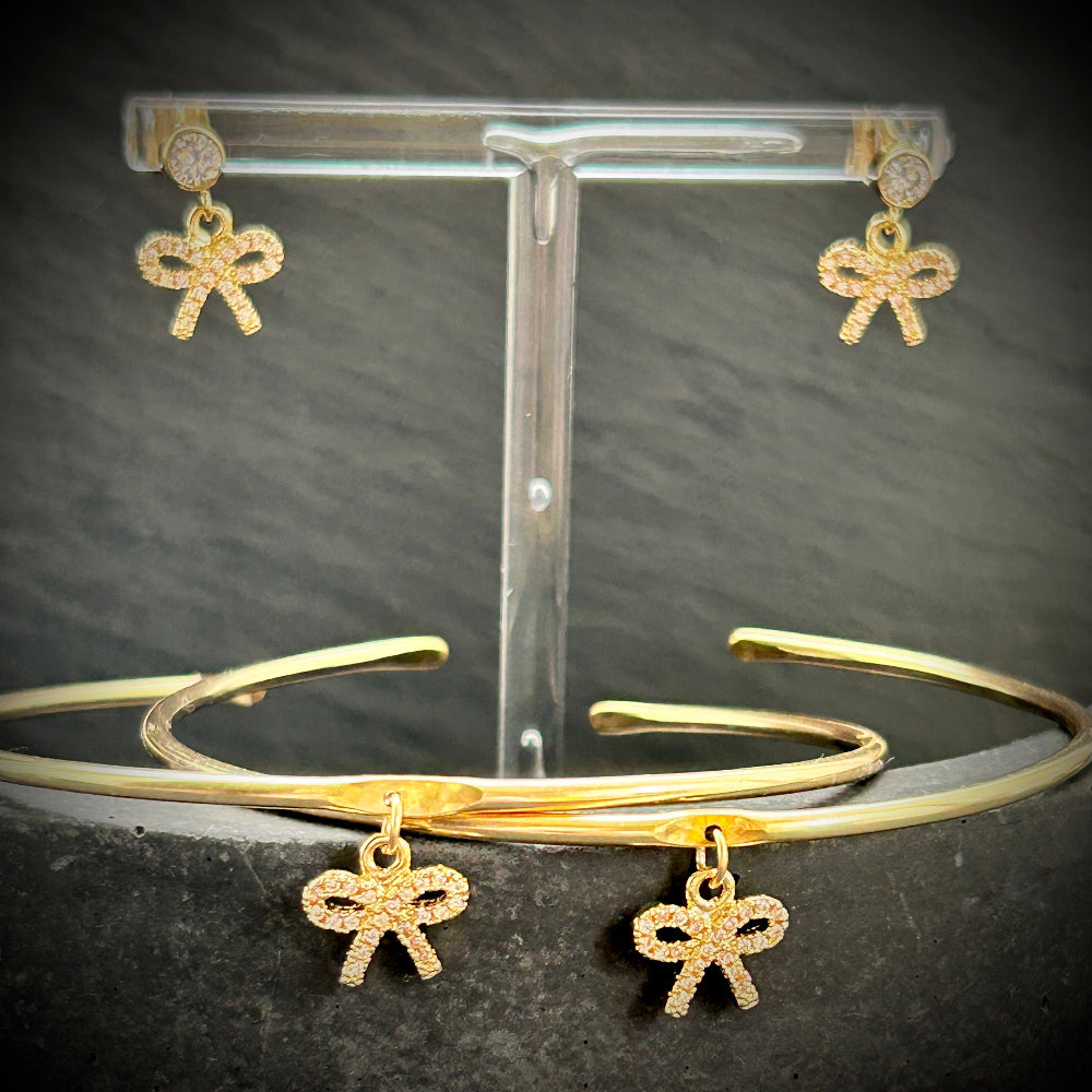 Gold sparkle bow earrings and bangle