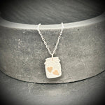Silver jar pendant with gold hearts