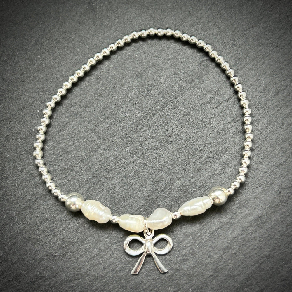 Pearl pop Bow Sterling silver beaded stacking bracelet