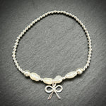 Pearl pop Bow Sterling silver beaded stacking bracelet