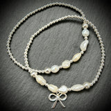 Pearl pop Sterling silver beaded stacking bracelets.