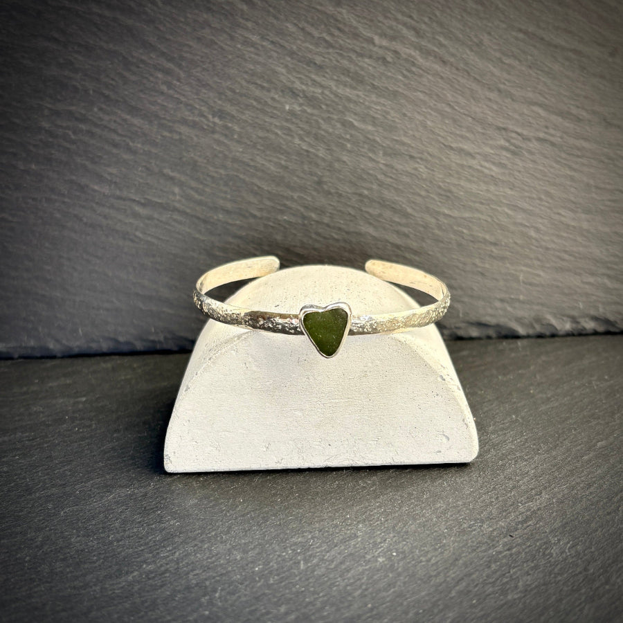 Sterling Silver cuff bangle with a green sea glass heart 