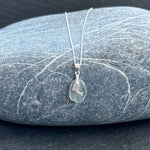 Sea glass necklace with silver dolphin