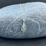 Sea glass necklace with silver dolphin