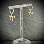 Silver hoop earrings with gold bow 