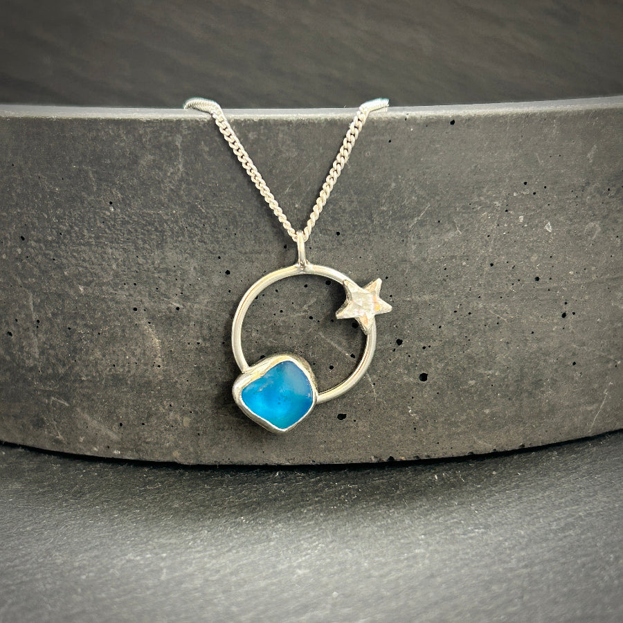 Sterling Silver Star necklace with bright turquoise Sea glass