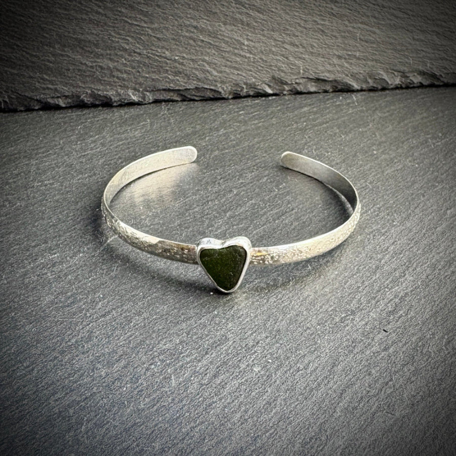 Sterling Silver cuff bangle with a green sea glass heart 