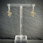 Silver hoop earrings with gold bow 
