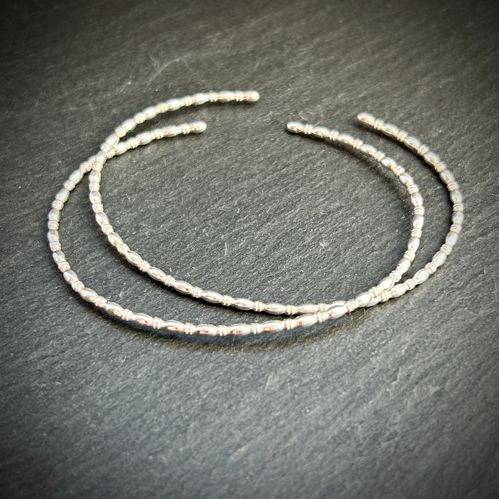 Sterling silver oval and rondelle cuff bangles