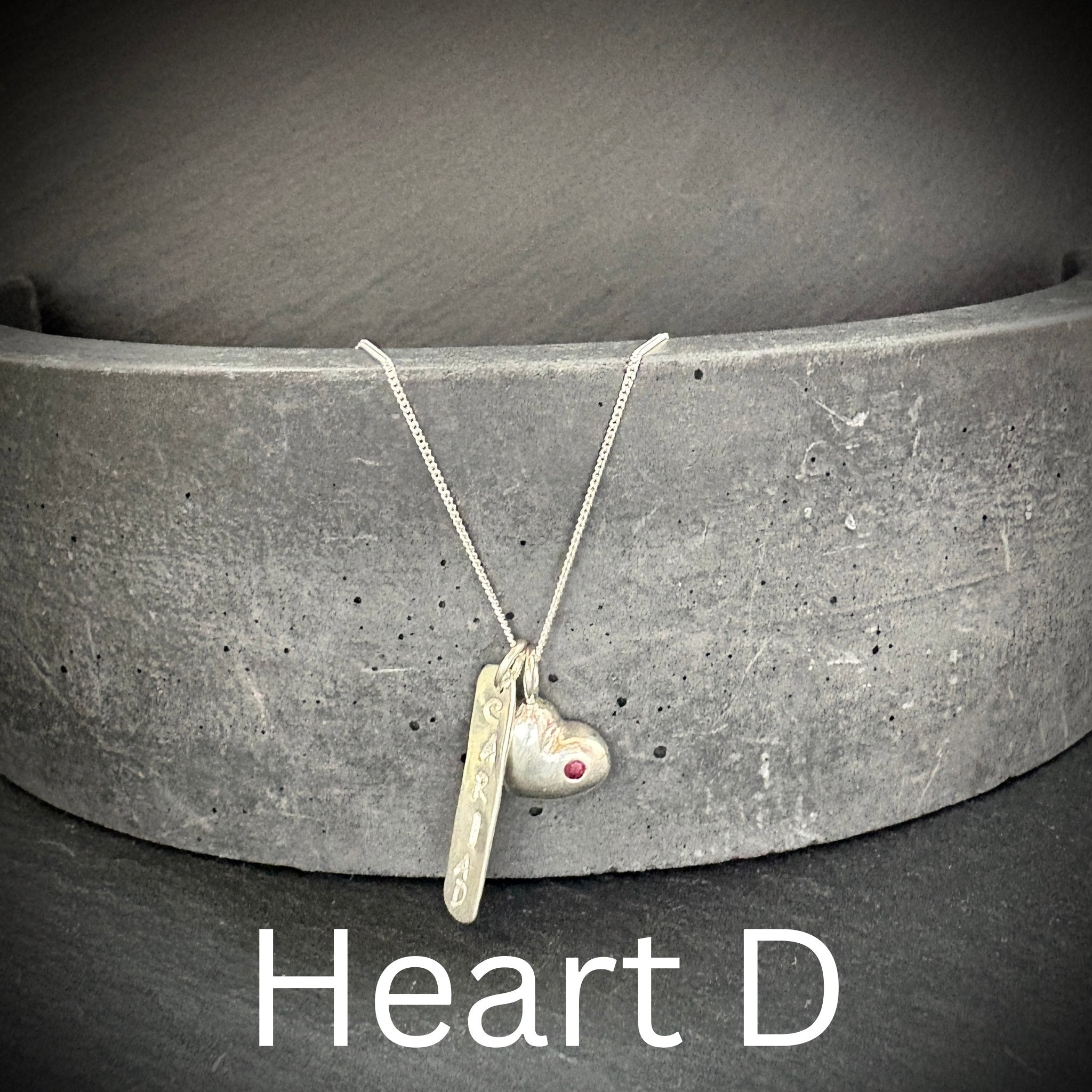 Sterling silver solid Heart pendant with inset Ruby and Cariad stamped tag